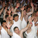 Adults wearing togas at party